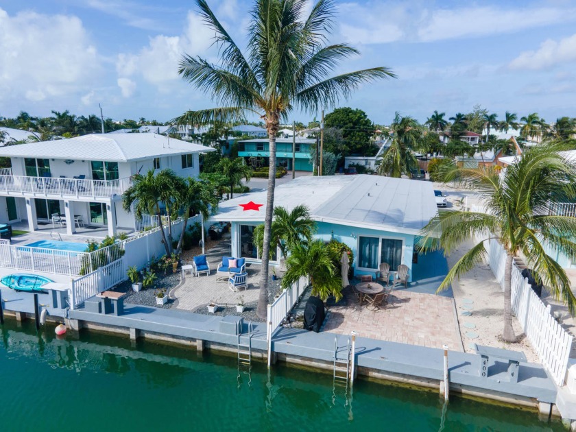 UPDATE:  The flood insurance for this beauty is only $2,726 / - Beach Home for sale in Key Colony Beach, Florida on Beachhouse.com