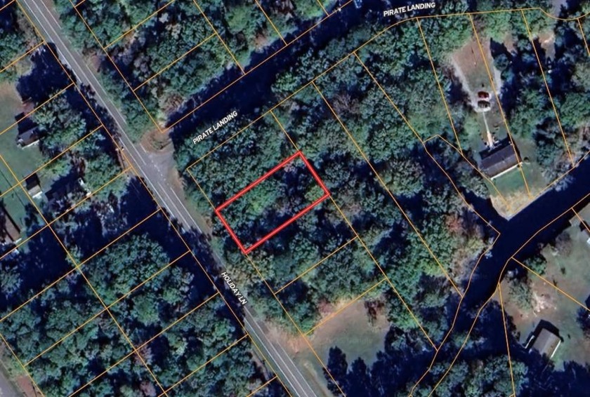 Tucked away in the peaceful beauty of Holiday Island, this 0 - Beach Lot for sale in Hertford, North Carolina on Beachhouse.com