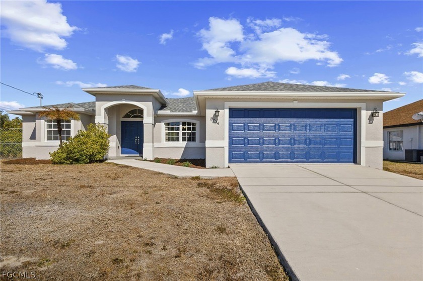 Welcome home to this inviting 3 bedroom, 2 bathroom residence - Beach Home for sale in Lehigh Acres, Florida on Beachhouse.com