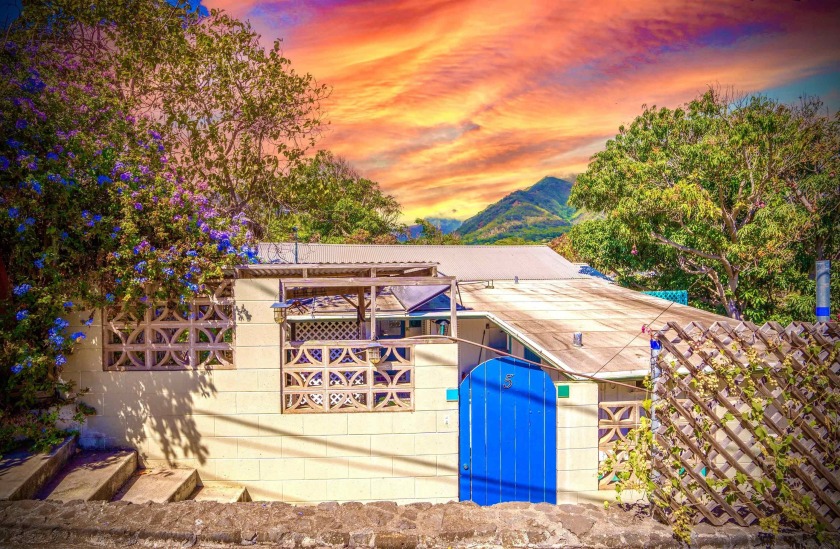 Discover this charming 4-bedroom, 3-bathroom classic Wailuku - Beach Home for sale in Wailuku, Hawaii on Beachhouse.com
