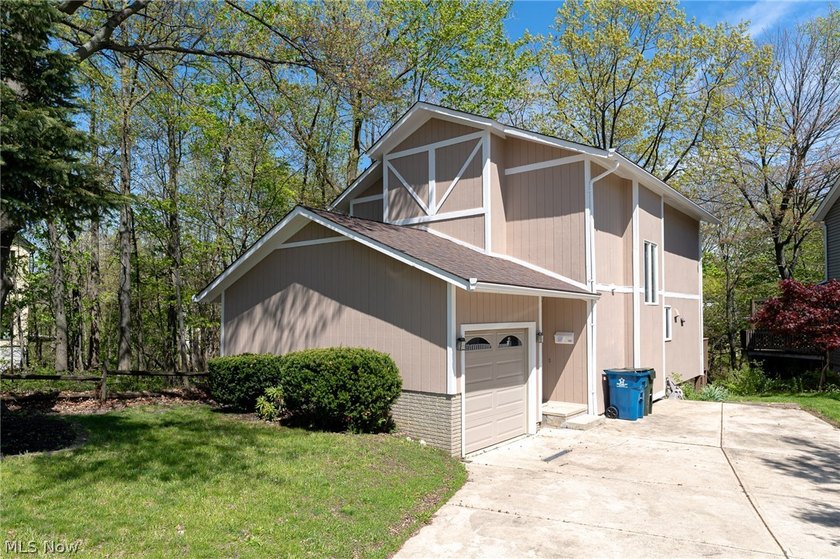 This late 20th-century, three-story contemporary residence - Beach Home for sale in Bay Village, Ohio on Beachhouse.com