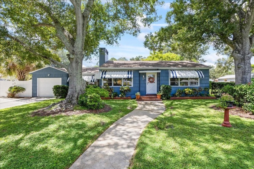 This charming Gulfport cottage is situated on a spacious double - Beach Home for sale in Gulfport, Florida on Beachhouse.com