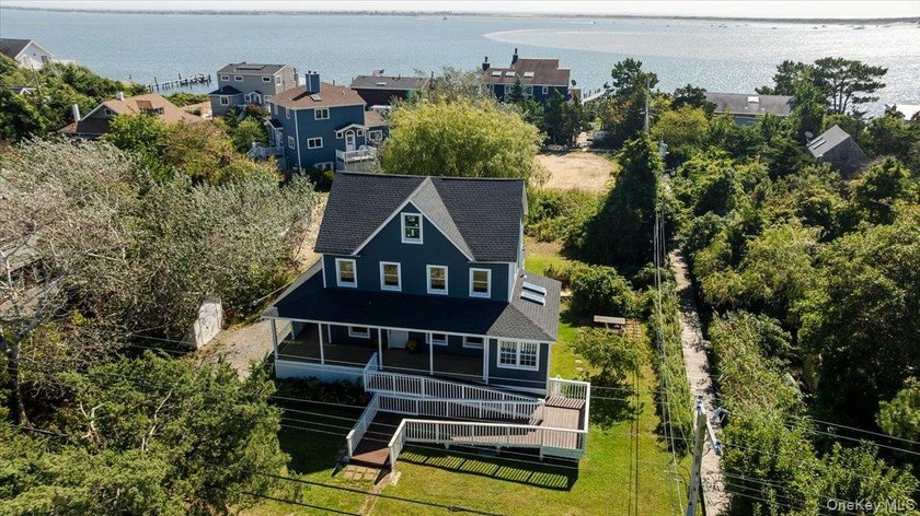 Escape to the beach and move right into this beautifully - Beach Home for sale in Oak Beach, New York on Beachhouse.com