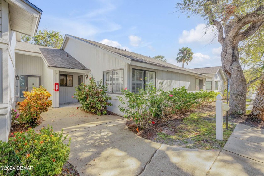 Nestled in the desirable Sea Woods community, this - Beach Condo for sale in New Smyrna Beach, Florida on Beachhouse.com