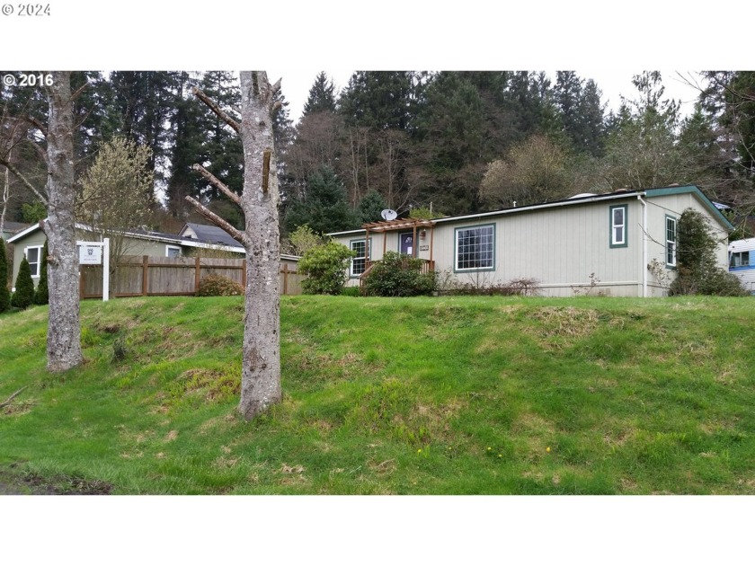 Double lot, full shop, great parking, and a Tillamook Bay view - Beach Home for sale in Bay City, Oregon on Beachhouse.com