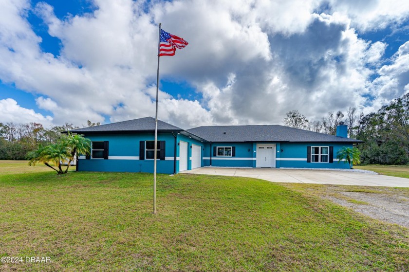 This 4 bedroom, 3 bath, concrete block, custom built pool home - Beach Home for sale in Port Orange, Florida on Beachhouse.com