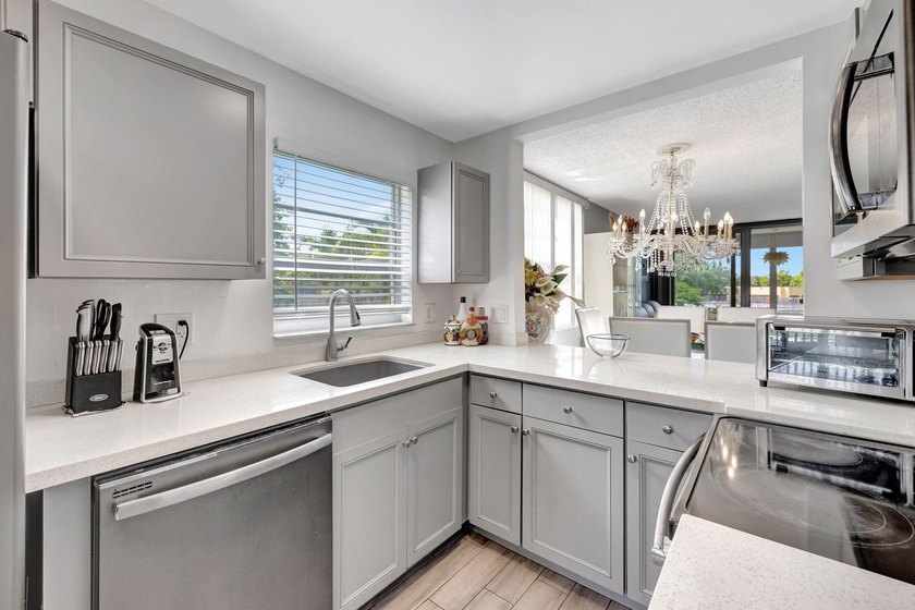 Step into this beautifully updated 2-bedroom, 2-bathroom condo - Beach Condo for sale in Tamarac, Florida on Beachhouse.com