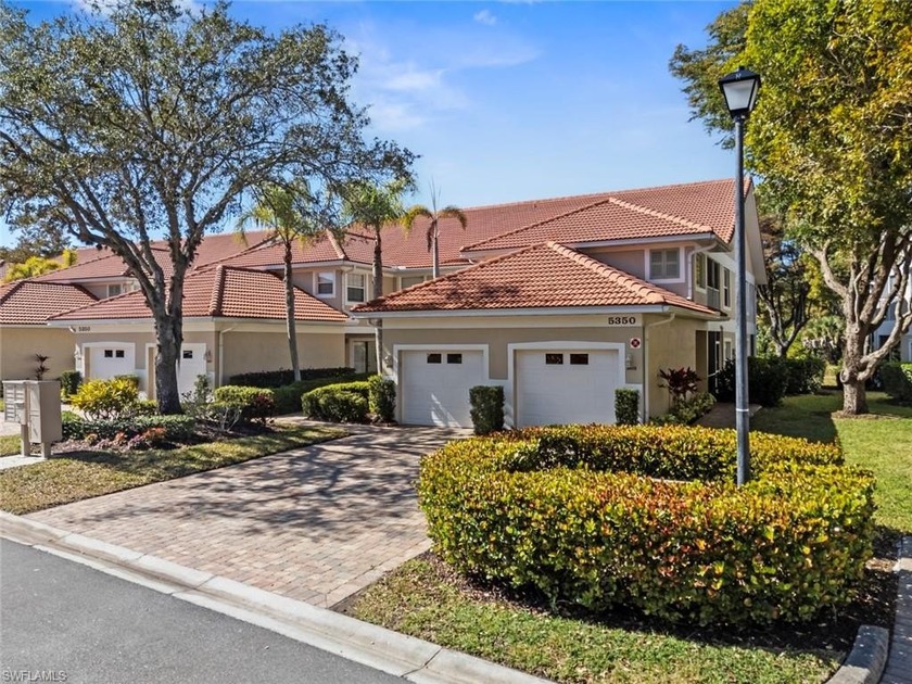 Welcome home! This bright second-floor end unit in Carlton Lakes - Beach Condo for sale in Naples, Florida on Beachhouse.com