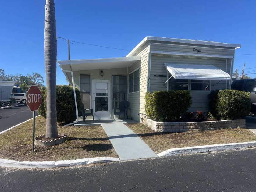 This is a LOVELY 1-Bedroom, 1-Bathroom FULLY FURNISHED home with - Beach Home for sale in Tarpon Springs, Florida on Beachhouse.com