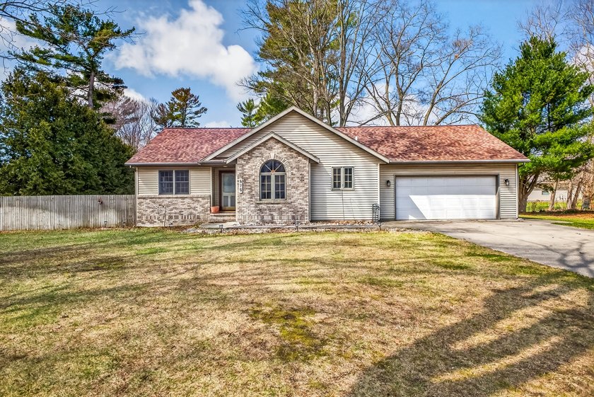 Brand new Beautiful roof just put on April 1st, 2026. This - Beach Home for sale in Muskegon, Michigan on Beachhouse.com