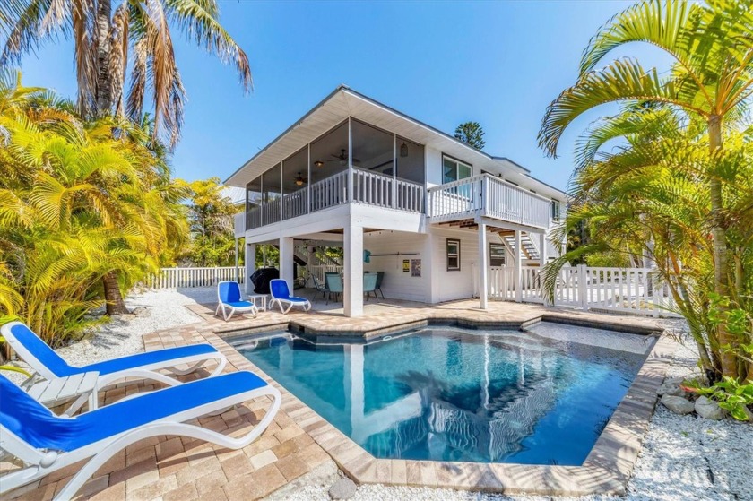 This is vacation perfection tucked on a quiet street on the - Beach Home for sale in Anna Maria, Florida on Beachhouse.com