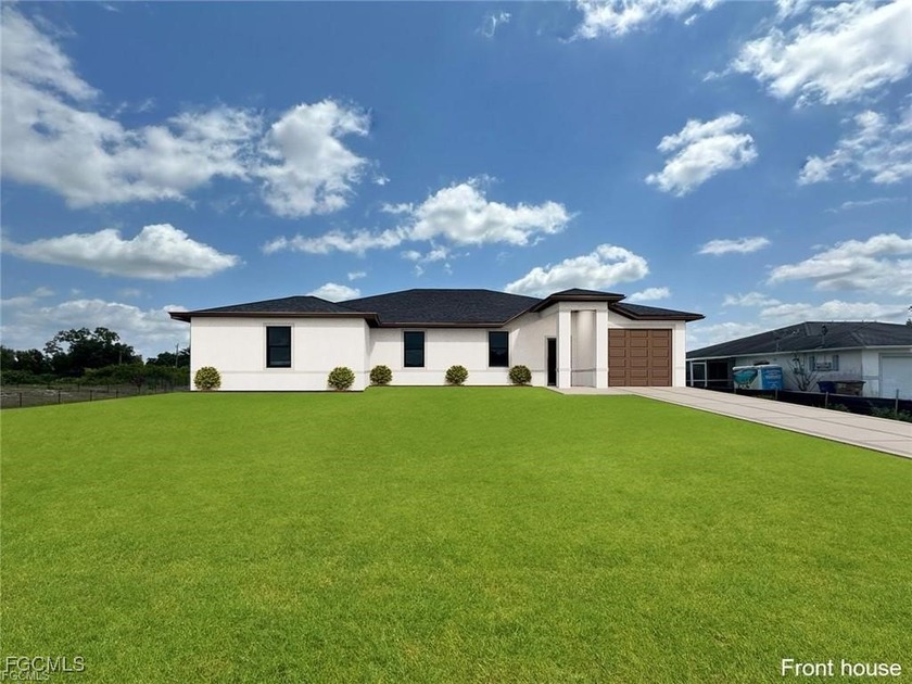 Welcome to this stunning duplex, featuring a modern-styled - Beach Home for sale in Lehigh Acres, Florida on Beachhouse.com