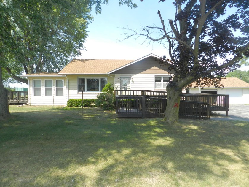 This 3 bedroom 1 bathroom home sits on over an acre of country - Beach Home for sale in Eau Claire, Michigan on Beachhouse.com