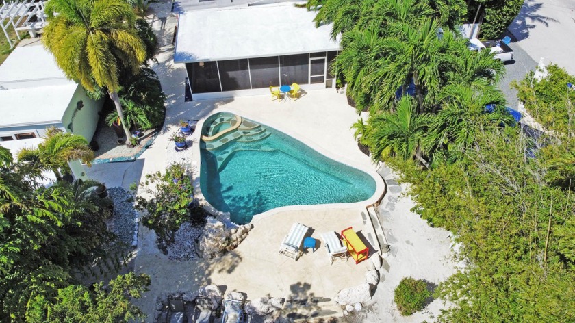 This beautiful secluded property features a delightful two - Beach Home for sale in Sugarloaf Key, Florida on Beachhouse.com