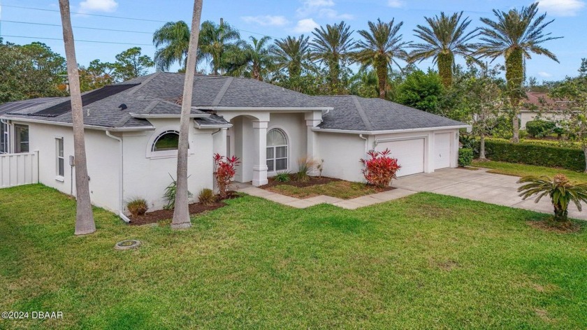 Welcome to this charming three-bedroom, two-bathroom pool home - Beach Home for sale in Port Orange, Florida on Beachhouse.com