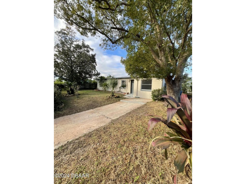 Completely remodeled three bedroom, 1 bath with bonus room and - Beach Home for sale in Daytona Beach, Florida on Beachhouse.com