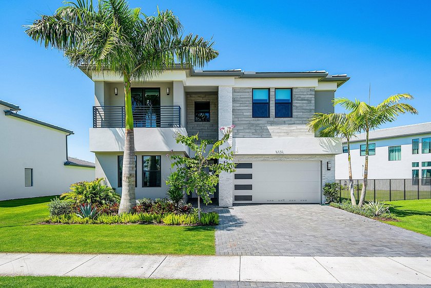 This upgraded Polynesia model is set on an oversized west-facing - Beach Home for sale in Boca Raton, Florida on Beachhouse.com