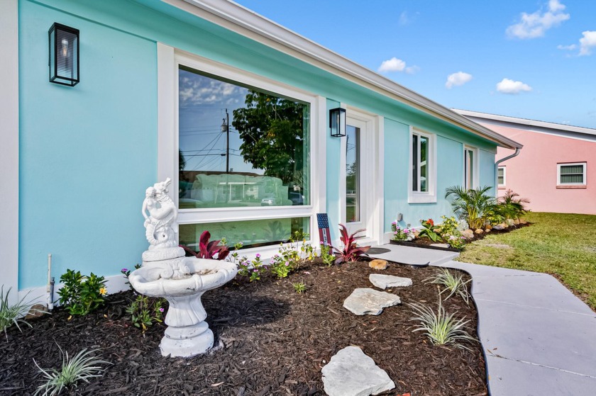 Come see this beautiful, navigable canal waterfront home that - Beach Home for sale in Merritt Island, Florida on Beachhouse.com
