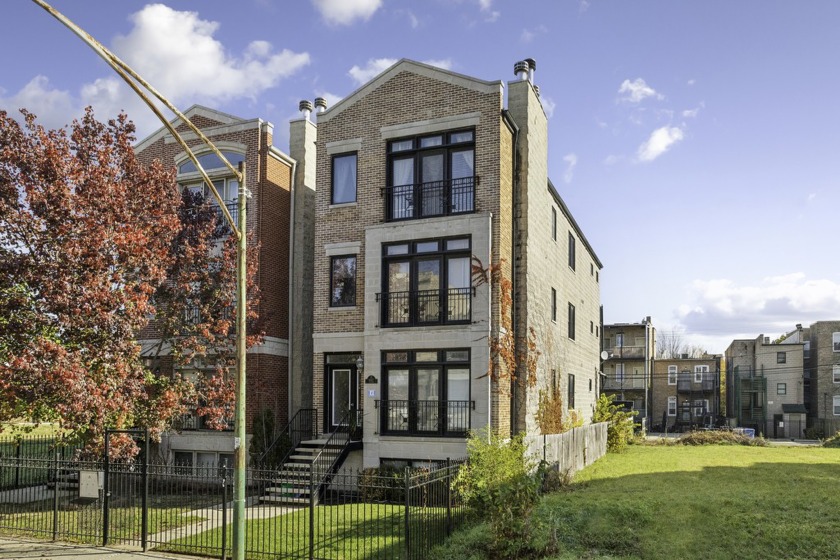 HOA PAID FOR FIRST 12 MONTHS! Welcome to your stunning new home - Beach Townhome/Townhouse for sale in Chicago, Illinois on Beachhouse.com