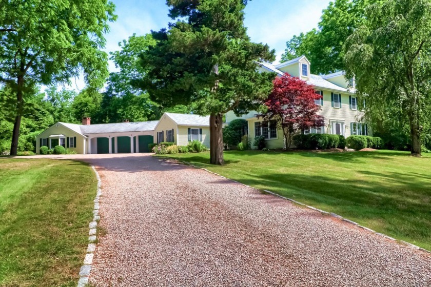 This inviting colonial on idyllic Mason's Island offers the best - Beach Home for sale in Stonington, Connecticut on Beachhouse.com