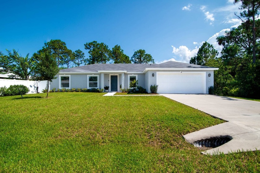 Beautifully maintained family home ready for your personal - Beach Home for sale in Palm Coast, Florida on Beachhouse.com