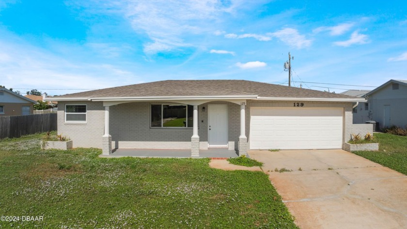 Welcome to this 3-bedroom, 2-bathroom home nestled in the Ocean - Beach Home for sale in Ormond Beach, Florida on Beachhouse.com