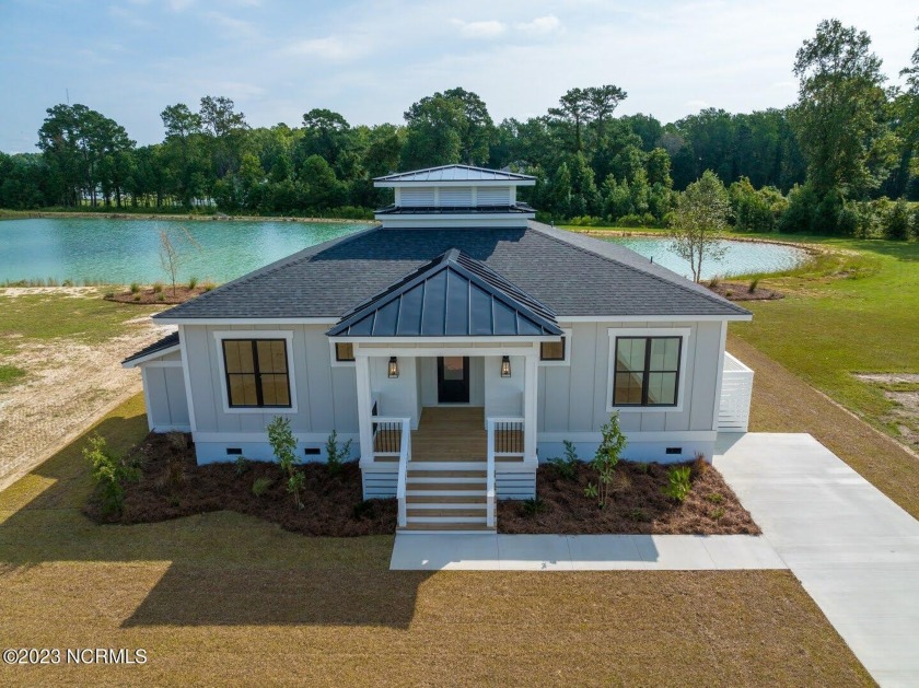 Landing on the lake is a new model home by 35 North Builders - Beach Home for sale in Minnesott Beach, North Carolina on Beachhouse.com