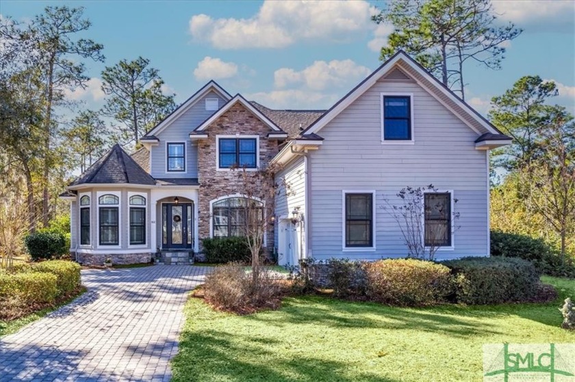 This exquisite property boasts a spacious owner's suite that - Beach Home for sale in Waverly, Georgia on Beachhouse.com