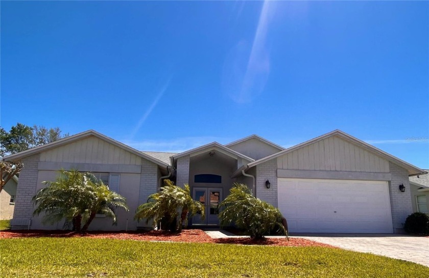 Motivated Seller! Make an offer! This GORGEOUS single-level - Beach Home for sale in Hudson, Florida on Beachhouse.com