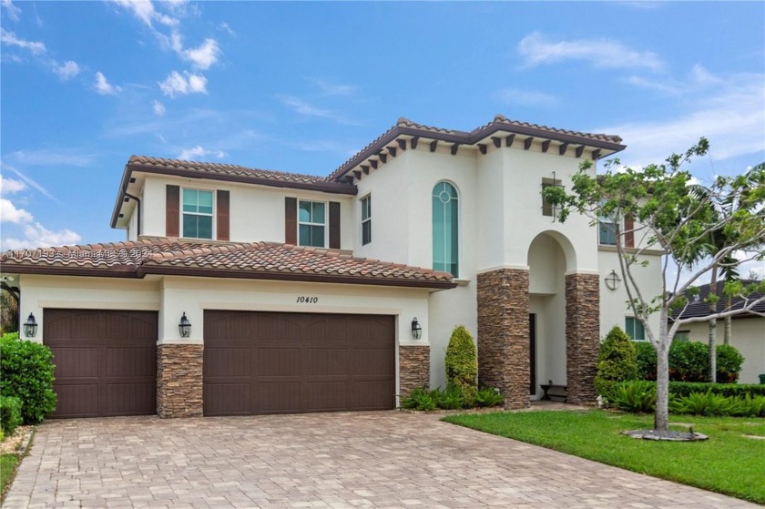 Stunning home is located in the exclusive Ranchette Isle - Beach Home for sale in Cooper City, Florida on Beachhouse.com