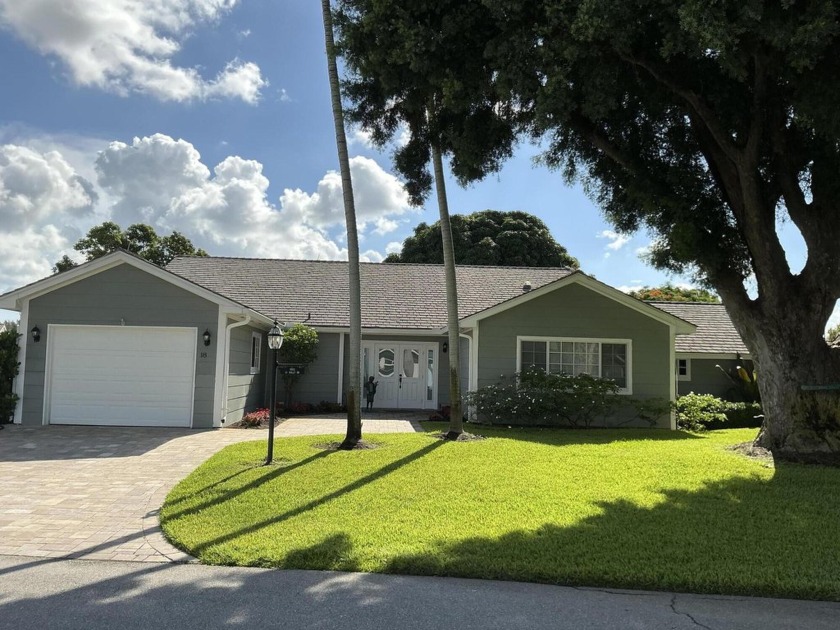 THIS REMODELED 4/3  VILLA ON THE LAKE WAS REDONE IN 2019/2020 - Beach Home for sale in Boynton Beach, Florida on Beachhouse.com