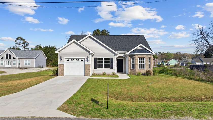 Welcome home to 908 Sandridge Rd in Little River. Built in 2024 - Beach Home for sale in Little River, South Carolina on Beachhouse.com