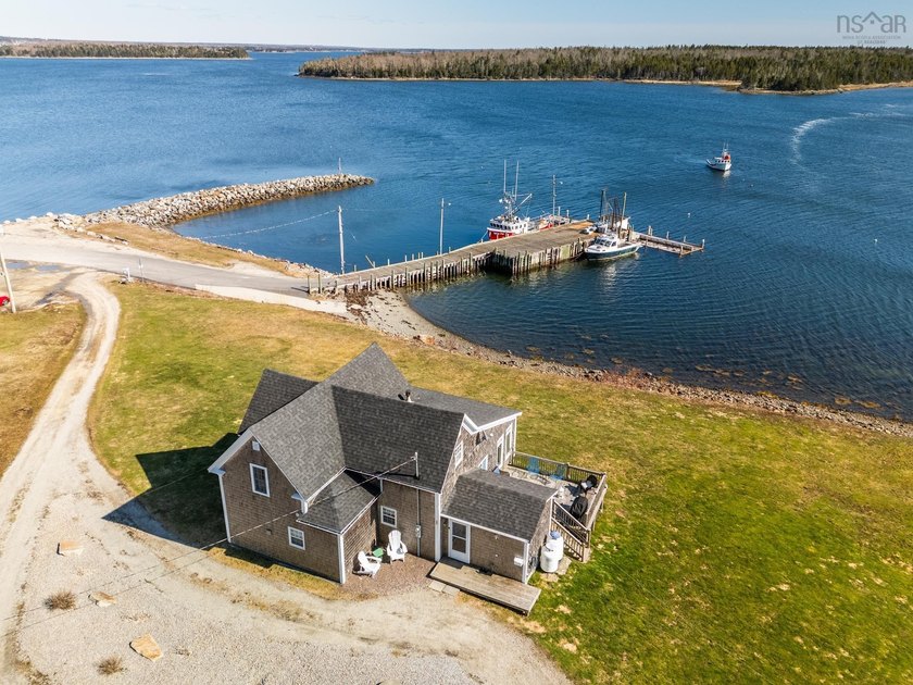 Perched at the water's edge, this beautifully updated 4-bedroom - Beach Home for sale in Morris Island, Nova Scotia on Beachhouse.com