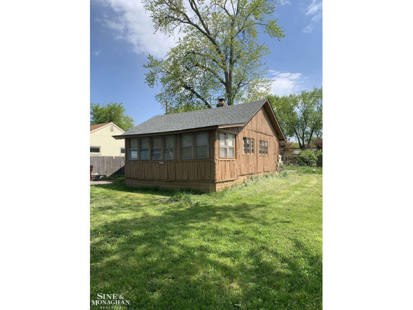 Charming two-bedroom, one-bath cottage-style home located in the - Beach Home for sale in Monroe, Michigan on Beachhouse.com