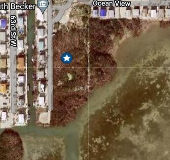 Rare find with this large oceanfront lot with owned dredged bay - Beach Lot for sale in Marathon, Florida on Beachhouse.com