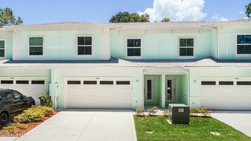 Step into your dream home today in these newly constructed - Beach Townhome/Townhouse for sale in New Smyrna Beach, Florida on Beachhouse.com