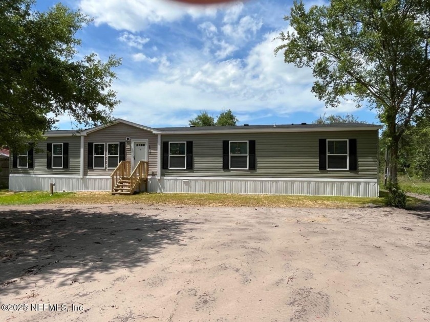 This very spacious Brand New MFH sits on 2.99 acres which part - Beach Home for sale in Jacksonville, Florida on Beachhouse.com
