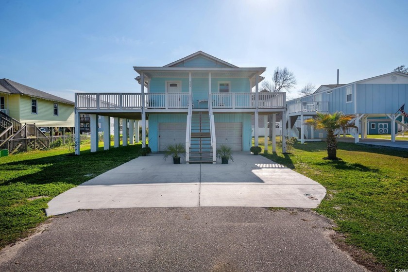 Beach lovers and investors! This fully remodeled raised beach - Beach Home for sale in Garden City Beach, South Carolina on Beachhouse.com