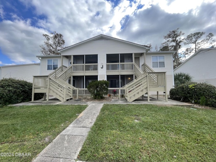 HIGH AND DRY, FULLY FURNISHED FIRST FLOOR CONDO! Enter into the - Beach Condo for sale in South Daytona, Florida on Beachhouse.com