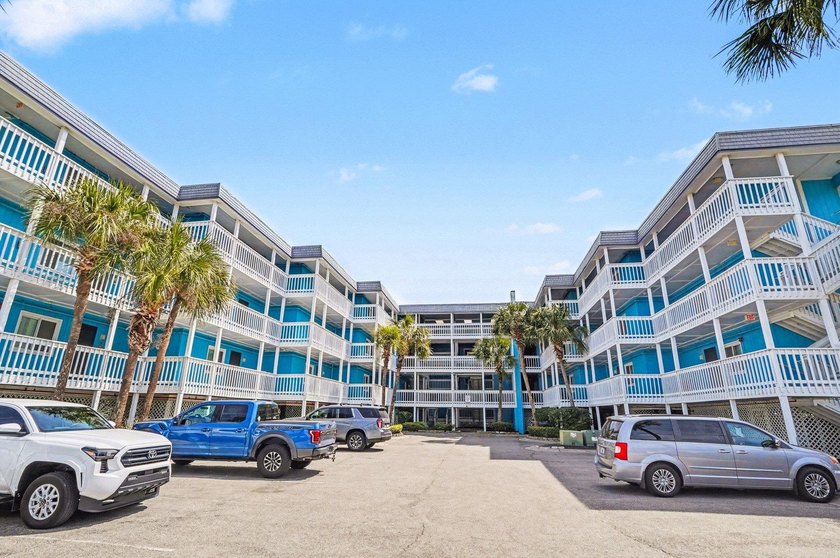 Discover this stunning two-bedroom, two-bathroom end unit - Beach Condo for sale in Garden City Beach, South Carolina on Beachhouse.com
