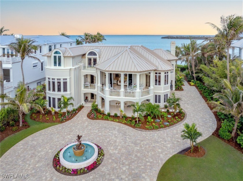 Embraced by the sparkling waters of the Gulf & the mesmerizing - Beach Home for sale in Captiva, Florida on Beachhouse.com