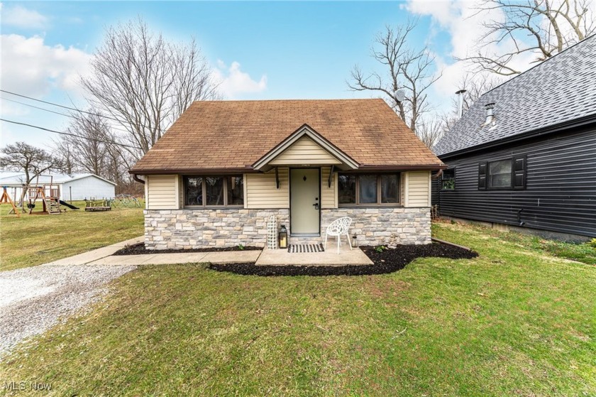 Discover this beautifully remodeled cottage-style home, nestled - Beach Home for sale in Vermilion, Ohio on Beachhouse.com