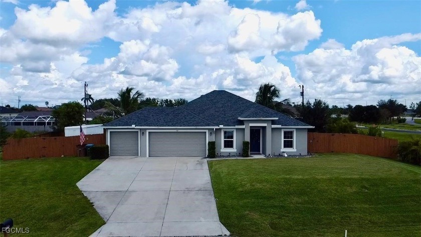 This beautiful well kept 3 bedroom, 2 bath, 3 car garage home is - Beach Home for sale in Cape Coral, Florida on Beachhouse.com