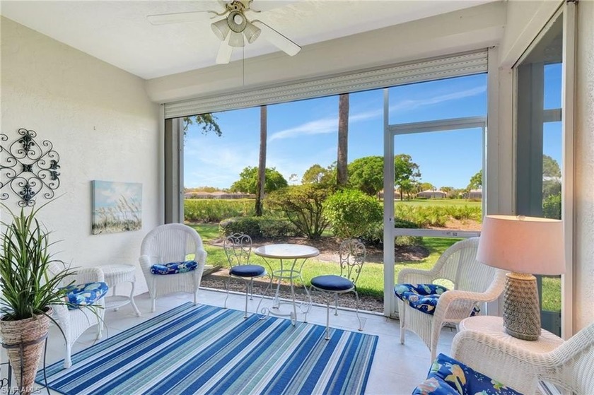 Wake up to tranquil lake views, swaying palms, and manicured - Beach Condo for sale in Bonita Springs, Florida on Beachhouse.com