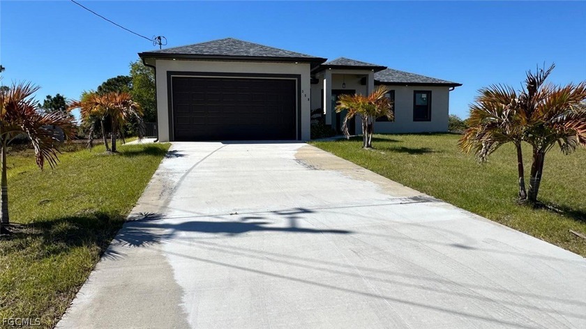 BRAND NEW CONSTRUCTION ON A CANAL LOT New 3 Bedroom/2 - Beach Home for sale in Lehigh Acres, Florida on Beachhouse.com