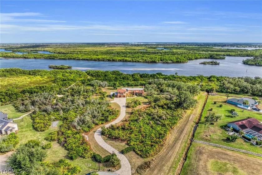 Tucked away within the deed-restricted, secluded enclave of - Beach Home for sale in Punta Gorda, Florida on Beachhouse.com