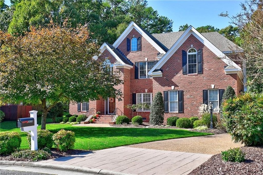 Discover effortless elegance in this custom brick home nestled - Beach Home for sale in Suffolk, Virginia on Beachhouse.com