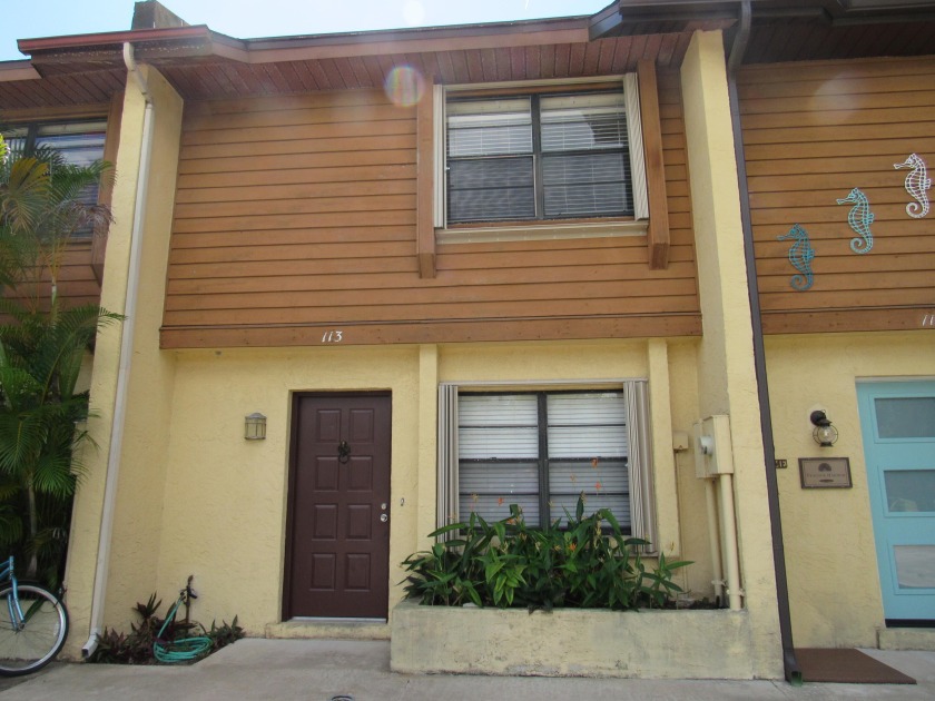 This two-story townhouse features two bedrooms and laundry - Beach Townhome/Townhouse for sale in Cape Canaveral, Florida on Beachhouse.com