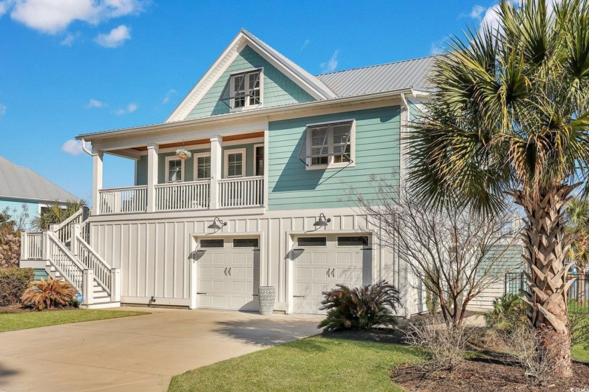 Welcome to this extraordinary lakefront retreat, a modern - Beach Home for sale in Murrells Inlet, South Carolina on Beachhouse.com