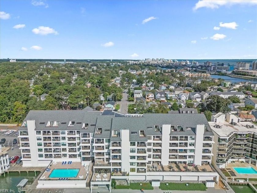 Take in stunning harbor sunrises and sunsets from this - Beach Condo for sale in Virginia Beach, Virginia on Beachhouse.com